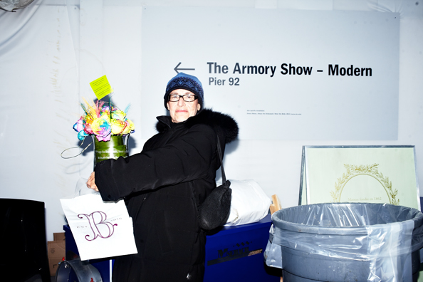 ALWAYS THE BRIDESMAID, NEVER THE BRIDE<br />
2013 Ongoing<br />
Photograph of Happening: Collectors “Taking Home” Replicated Wedding Table Centerpieces <br />
Variable Dimensions <br />