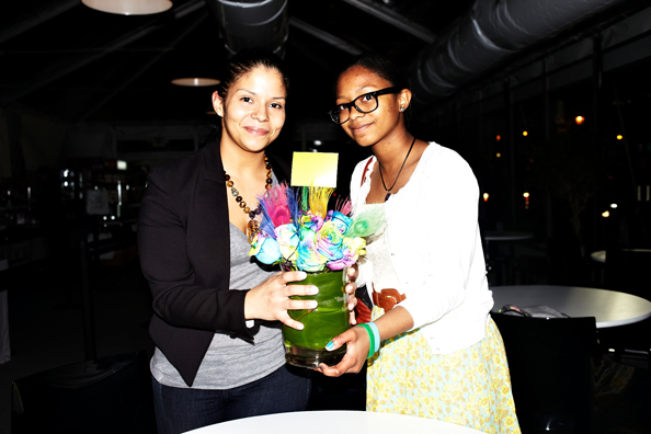 ALWAYS THE BRIDESMAID, NEVER THE BRIDE<br />
2013 Ongoing<br />
Photograph of Happening: Collectors “Taking Home” Replicated Wedding Table Centerpieces <br />
Variable Dimensions <br />