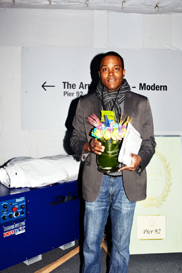 ALWAYS THE BRIDESMAID, NEVER THE BRIDE<br />
2013 Ongoing<br />
Photograph of Happening: Collectors “Taking Home” Replicated Wedding Table Centerpieces <br />
Variable Dimensions <br />