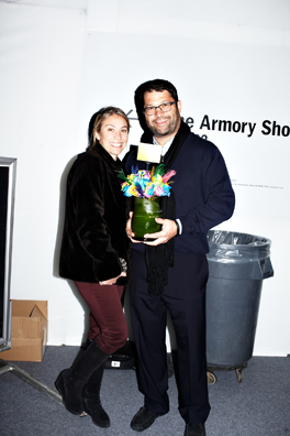 ALWAYS THE BRIDESMAID, NEVER THE BRIDE<br />
2013 Ongoing<br />
Photograph of Happening: Collectors “Taking Home” Replicated Wedding Table Centerpieces <br />
Variable Dimensions <br />