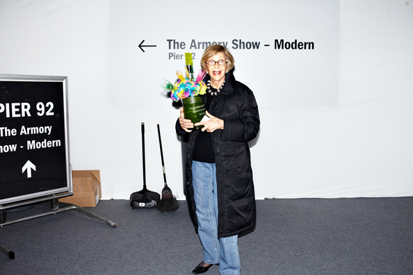 ALWAYS THE BRIDESMAID, NEVER THE BRIDE<br />
2013 Ongoing<br />
Photograph of Happening: Collectors “Taking Home” Replicated Wedding Table Centerpieces <br />
Variable Dimensions <br />