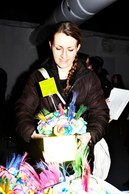 ALWAYS THE BRIDESMAID, NEVER THE BRIDE<br />
2013 Ongoing<br />
Photograph of Happening: Collectors “Taking Home” Replicated Wedding Table Centerpieces <br />
Variable Dimensions <br />