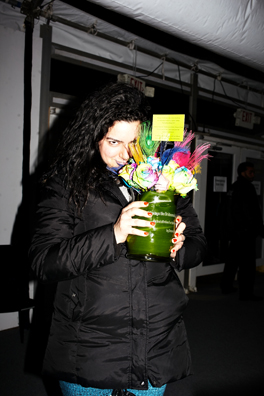 ALWAYS THE BRIDESMAID, NEVER THE BRIDE<br />
2013 Ongoing<br />
Photograph of Happening: Collectors “Taking Home” Replicated Wedding Table Centerpieces <br />
Variable Dimensions <br />