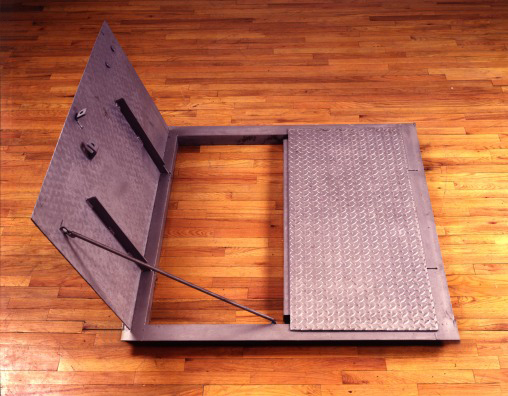 Trap Door (Open)<br />
1991<br />
Floor Gate Installation Replicating Peter Blum Gallery Floor Gate<br />
52”  x 46”  <br />