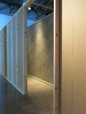 PLEASE<br />
2011 Ongoing<br />
Exterior Installation View of Entry<br />
Walls: Chinese Box, Series of Rooms Constructed of Wood Frame Studs, Drywall, Faux Marble Wallpaper, Baseboards, and Crown<br />