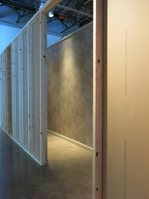 PLEASE<br />
2011 Ongoing<br />
Exterior Installation View of Entry<br />
Walls: Chinese Box, Series of Rooms Constructed of Wood Frame Studs, Drywall, Faux Marble Wallpaper, Baseboards, and Crown<br />