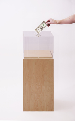 “PAY WHAT YOU WISH BUT YOU MUST PAY SOMETHING”<br />
2013 Ongoing<br />
Floor: One of 18 Functioning American Art Museum Donation Boxes replicated and Displayed at an Art Fair in Various Positions throughout the Fair<br />
Aspen Art Museum<br />
Variable Dimensions<br />