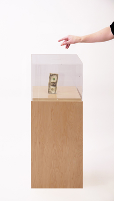 “PAY WHAT YOU WISH BUT YOU MUST PAY SOMETHING”<br />
2013 Ongoing<br />
Floor: One of 18 Functioning American Art Museum Donation Boxes replicated and Displayed at an Art Fair in Various Positions throughout the Fair<br />
Aspen Art Museum<br />
Variable Dimensions<br />