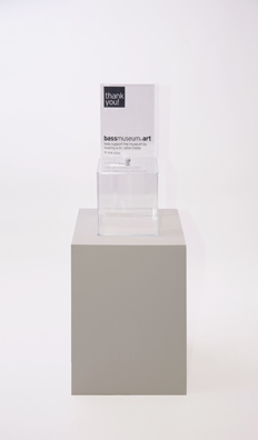 “PAY WHAT YOU WISH BUT YOU MUST PAY SOMETHING”<br />
2013 Ongoing<br />
Floor: One of 18 Functioning American Art Museum Donation Boxes replicated and Displayed at an Art Fair in Various Positions throughout the Fair<br />
Bass Museum of Art<br />
Variable Dimensions<br />