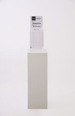 “PAY WHAT YOU WISH BUT YOU MUST PAY SOMETHING”<br />
2013 Ongoing<br />
Floor: One of 18 Functioning American Art Museum Donation Boxes replicated and Displayed at an Art Fair in Various Positions throughout the Fair<br />
Boulder Museum of Contemporary Art<br />
Variable Dimensions<br />