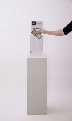 “PAY WHAT YOU WISH BUT YOU MUST PAY SOMETHING”<br />
2013 Ongoing<br />
Floor: One of 18 Functioning American Art Museum Donation Boxes replicated and Displayed at an Art Fair in Various Positions throughout the Fair<br />
Boulder Museum of Contemporary Art<br />
Variable Dimensions<br />