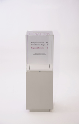 “PAY WHAT YOU WISH BUT YOU MUST PAY SOMETHING”<br />
2013 Ongoing<br />
Floor: One of 18 Functioning American Art Museum Donation Boxes replicated and Displayed at an Art Fair in Various Positions throughout the Fair<br />
Contemporary Arts Museum Houston<br />
Variable Dimensions<br />