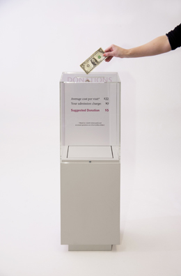 “PAY WHAT YOU WISH BUT YOU MUST PAY SOMETHING”<br />
2013 Ongoing<br />
Floor: One of 18 Functioning American Art Museum Donation Boxes replicated and Displayed at an Art Fair in Various Positions throughout the Fair<br />
Contemporary Arts Museum Houston<br />
Variable Dimensions<br />
