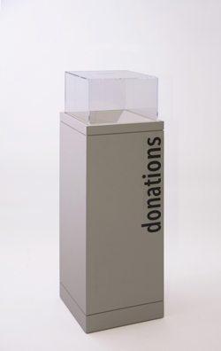 “PAY WHAT YOU WISH BUT YOU MUST PAY SOMETHING”<br />
2013 Ongoing<br />
Floor: One of 18 Functioning American Art Museum Donation Boxes replicated and Displayed at an Art Fair in Various Positions throughout the Fair<br />
The Nelson-Atkins Museum of Art<br />
Variable Dimensions<br />