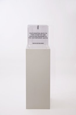 “PAY WHAT YOU WISH BUT YOU MUST PAY SOMETHING”<br />
2013 Ongoing<br />
Floor: One of 18 Functioning American Art Museum Donation Boxes replicated and Displayed at an Art Fair in Various Positions throughout the Fair<br />
The Contemporary Austin<br />
Variable Dimensions<br />