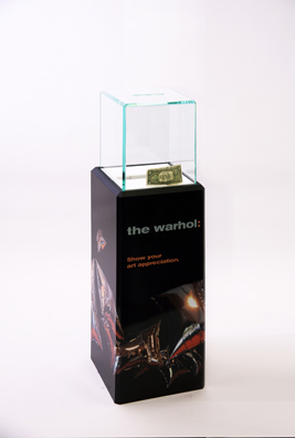 “PAY WHAT YOU WISH BUT YOU MUST PAY SOMETHING”<br />
2013 Ongoing<br />
Floor: One of 18 Functioning American Art Museum Donation Boxes replicated and Displayed at an Art Fair in Various Positions throughout the Fair<br />
Andy Warhol Museum<br />
Variable Dimensions<br />