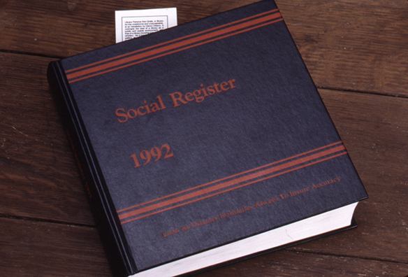 LIBRARY PERSONA NON GRATA<br />
1993<br />
Detail: New York Social Register - closed<br />
1992 New York Social Register, library table, bookmark<br />