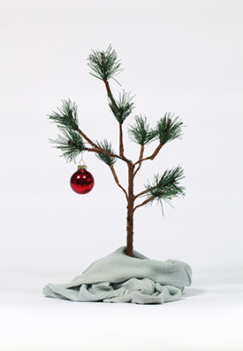 A VERY NINEY CHRISTMAS <br />
2007 Ongoing<br />
Photo of Niney at base of Linus Christmas tree<br />