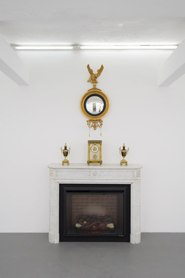 TRICIA NIXON: SUMMER OF 1973 <br/>
2017 Ongoing <br/>
Antique Marble Fireplace, Mirror, Clock, Urns, and Working Heating Element <br/>
Variable Dimensions <br/>
