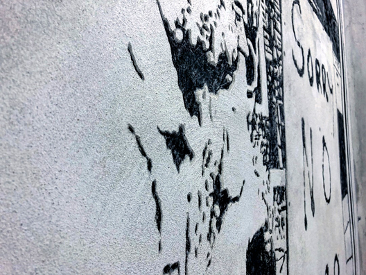 GAS SHORTAGE <br/>
2018 Ongoing <br/>
Detail: Google Image of 1973 Gas Shortage Etched in Wall Using the Sgrafitto Technique <br/>
Variable Dimensions <br/>