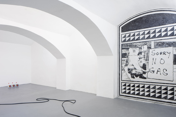 GAS SHORTAGE <br/>
2018 Ongoing <br/>
Google Image of 1973 Gas Shortage Etched in Wall Using the Sgrafitto Technique, 3 Windshield Fluid Relics Containing the Scrapings of the Sgrafitto, Working Milton Driveway Bell, Hose, and Anchor <br/>
Variable Dimensions <br/>