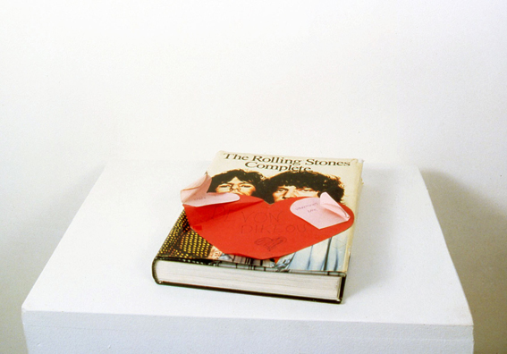 “MISS AMANDA JONES” <br/>
2000 Ongoing <br/>
The Artist's Rolling Stone Song Book Closed Showing Hand Made Valentine Given to the Artist in 1983 by Her College Roommates, Alex Davis and Natalie Fair<br/>
7” x 10” x 1”<br/>