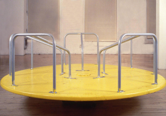 “RAINDROPS KEEP FALLING ON MY HEAD”<br />
1991 Ongoing<br />
Functioning Playground Whirl-i-gig Installed in Gallery for Viewers to Play, Rest, Sit on, and Enjoy<br />
90″ in Diameter x 40″ at Highest Point <br />
Unique, 1 AP<br />