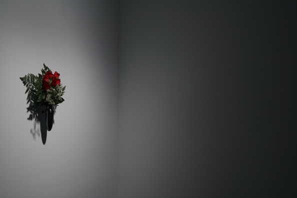 MARILYN MONROE WANTED TO BE BURIED IN PUCCI <br />
2008 Ongoing <br />
6 Red Roses Arranged in a Funerary Vase and Changed Twice Weekly for the Duration of the Show <br />
Provided by the Parisian, the Florist DiMaggio Hired to Twice Weekly Send Roses to Monroe's Burial Vault and Arrange in Her Funerary Vase <br />