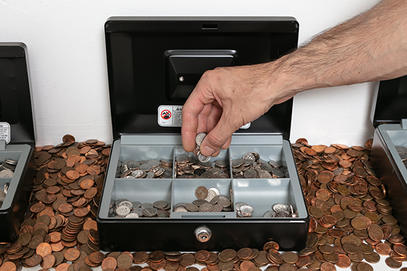 PETTY CASH<br />
1990 Ongoing<br />Cash Boxes Containing Artist’s Spare Change<br />
Variable Dimensions
