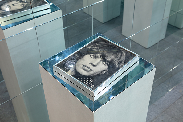 BLOW<br />
1982 Ongoing<br />Aluminum Framed Black and White Photograph of Mick Jagger Used as a Cocaine Tray by the Artist and Acquaintances During the ‘80s and Left Uncleaned with Drug and Saliva Residue on Top<br />
8 x 11 x 1 inches