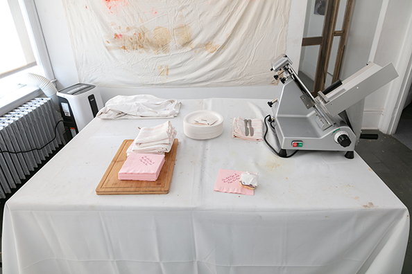 ONE LITTLE PIGGY ATE ROAST BEEF, ONE LITTLE PIGGY HAS NONE<br />
1991 Ongoing<br />
Happening Relics: Professional Meat Slicer, Table Where Happening Occurred, Refrigerator with Leftovers, Pans, Meat Thermometers, Stained Tablecloth, Napkins Displayed in Napkin Ring Holders Happening: 100 Pounds of Roast Beef, Sliced, Served in Sandwiches, and Consumed in<br />
Variable Dimensions
