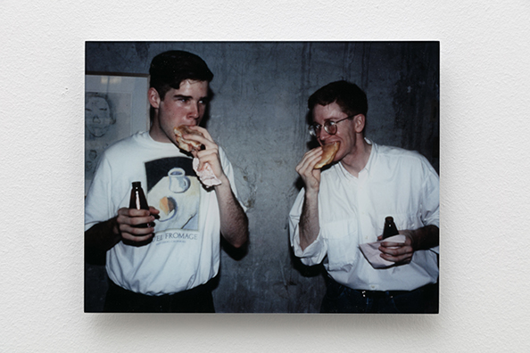 ONE LITTLE PIGGY ATE ROAST BEEF, ONE LITTLE PIGGY HAS NONE<br />
1991 Ongoing<br />
Photograph of Happening: Chris Malstead and Bill Griswold Get Down on It<br />
Happening: 100 Pounds of Roast Beef, Sliced, Served in Sandwiches, and Consumed in <br />
Variable Dimensions<br />
C-Print: 8 1/2 x 11 inches