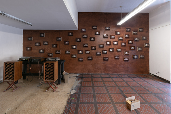 MAMAS DON’T LET YOUR BABIES GROW UP TO BE COWBOYS<br />
2009 Ongoing<br />
Wall: 56 C-Prints of Name Plates Reserving Hotel Rooms in Perpetuity for 56 Jazz Legends Mounted on Wood with Non-Glare Plexiglas Surface and Installed on a Wall of Wood Paneling<br />
C-Prints: 7 3/4 x 9 3/4 x 3x4 inches each