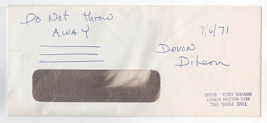 “DIVORCE” (01:18) <br/>
1972 Ongoing<br />
Trashcan with Envelope Inside Containing the Artist’s Hair from When She Was 9 Years Old and Had Cut Her Own Hair, Salvaged by Artist’s Father<br />
Trash Can: 11 in x 6 in x 9 in, Envelope: 4 in x 9 in