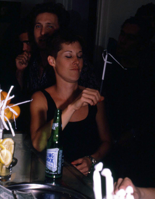 SUCK<br />
1991 Ongoing<br />
Happening: Plastic Straws with Fancy Handmade Paper Tops Served in All Drinks at Various Art Fairs and Art Openings, Displayed in Bouquets in Bar Area, and as Relics<br />
Series of 10 “Straw Bouquets”, 500 Individual Straws/Bouquet<br />
Photograph of Happening NY: Sparkler or Helicopter, Les Ayre Can't Decide<br />
Edition: 2, 1 AP<br />