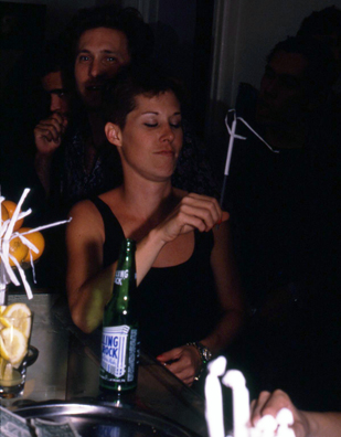 SUCK<br />
1991 Ongoing<br />
Happening: Plastic Straws with Fancy Handmade Paper Tops Served in All Drinks at Various Art Fairs and Art Openings, Displayed in Bouquets in Bar Area, and as Relics<br />
Series of 10 “Straw Bouquets”, 500 Individual Straws/Bouquet<br />
Photograph of Happening NY: Sparkler or Helicopter, Les Ayre Can't Decide<br />
Edition: 2, 1 AP<br />