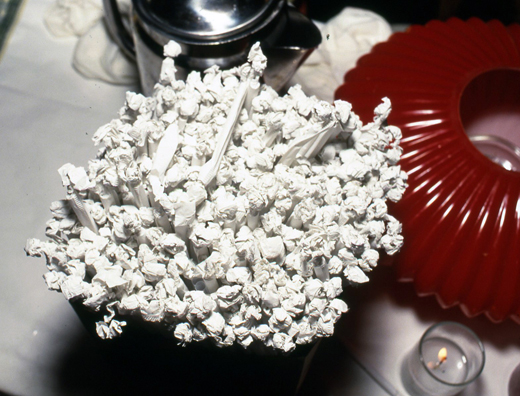 SUCK<br />
1991 Ongoing<br />
Happening: Plastic Straws with Fancy Handmade Paper Tops Served in All Drinks at Various Art Fairs and Art Openings, Displayed in Bouquets in Bar Area, and as Relics<br />
Series of 10 “Straw Bouquets”, 500 Individual Straws/Bouquet<br />
Photograph of Happening NY: Don't Confuse This Bouquet with the Bar Snack, Popcorn<br />
Edition: 2, 1 AP<br />