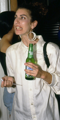 SUCK<br />
1991 Ongoing<br />
Happening: Plastic Straws with Fancy Handmade Paper Tops Served in All Drinks at Various Art Fairs and Art Openings, Displayed in Bouquets in Bar Area, and as Relics<br />
Series of 10 “Straw Bouquets”, 500 Individual Straws/Bouquet<br />
Photograph of Happening NY: “Hit Me With Your Best Shot” Pat Benatar Look-a-Like Exults<br />
Edition: 2, 1 AP<br />