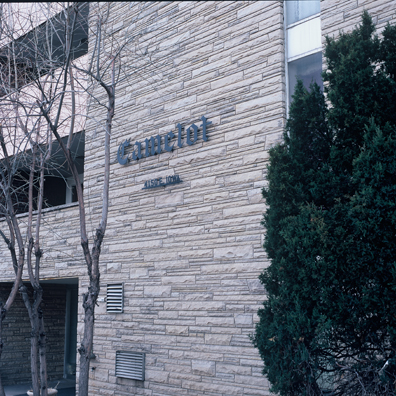 DISPLACED DENVER: THE CAMELOT <br/>
2000 Ongoing <br/>
Cibachrome Print <br/>
Series of Denver Apartment Buildings Named After Famous Politicians, Artists, Landmarks, Neighborhoods, Beaches, Styles, Museums, Islands, Cocktails, Clothing, Pirates, Warriors, Automobiles, Restaurants, Race Tracks, Festivals, Writers, Cities, Explorers, Teams, Palaces, Stores, Poets, Song Writers, Hotels, Magazines, Fictional Places, Architectural Elements, Holidays, Etc <br/ >