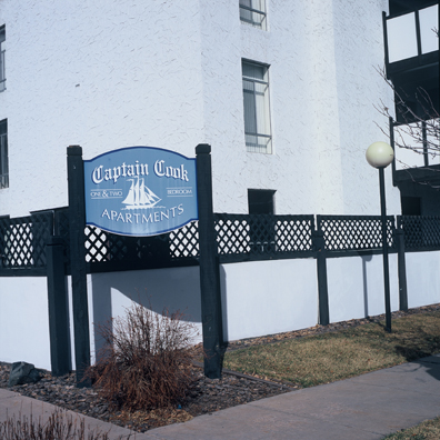 DISPLACED DENVER: THE CAPTAIN COOK<br/>
2000 Ongoing <br/>
Cibachrome Print <br/>
Series of Denver Apartment Buildings Named After Famous Politicians, Artists, Landmarks, Neighborhoods, Beaches, Styles, Museums, Islands, Cocktails, Clothing, Pirates, Warriors, Automobiles, Restaurants, Race Tracks, Festivals, Writers, Cities, Explorers, Teams, Palaces, Stores, Poets, Song Writers, Hotels, Magazines, Fictional Places, Architectural Elements, Holidays, Etc <br/ >