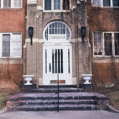 DISPLACED DENVER: THE CORDOVA<br/>
2000 Ongoing <br/>
Cibachrome Print <br/>
Series of Denver Apartment Buildings Named After Famous Politicians, Artists, Landmarks, Neighborhoods, Beaches, Styles, Museums, Islands, Cocktails, Clothing, Pirates, Warriors, Automobiles, Restaurants, Race Tracks, Festivals, Writers, Cities, Explorers, Teams, Palaces, Stores, Poets, Song Writers, Hotels, Magazines, Fictional Places, Architectural Elements, Holidays, Etc <br/ >