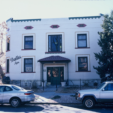 DISPLACED DENVER: THE DALLAS<br/>
2000 Ongoing <br/>
Cibachrome Print <br/>
Series of Denver Apartment Buildings Named After Famous Politicians, Artists, Landmarks, Neighborhoods, Beaches, Styles, Museums, Islands, Cocktails, Clothing, Pirates, Warriors, Automobiles, Restaurants, Race Tracks, Festivals, Writers, Cities, Explorers, Teams, Palaces, Stores, Poets, Song Writers, Hotels, Magazines, Fictional Places, Architectural Elements, Holidays, Etc <br/ >