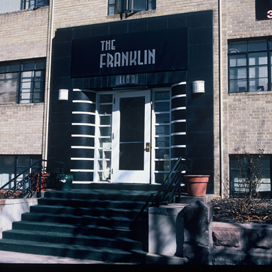 DISPLACED DENVER: THE FRANKLIN<br/>
2000 Ongoing <br/>
Cibachrome Print <br/>
Series of Denver Apartment Buildings Named After Famous Politicians, Artists, Landmarks, Neighborhoods, Beaches, Styles, Museums, Islands, Cocktails, Clothing, Pirates, Warriors, Automobiles, Restaurants, Race Tracks, Festivals, Writers, Cities, Explorers, Teams, Palaces, Stores, Poets, Song Writers, Hotels, Magazines, Fictional Places, Architectural Elements, Holidays, Etc <br/ >