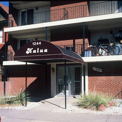 DISPLACED DENVER: THE KALUA<br/>
2000 Ongoing <br/>
Cibachrome Print <br/>
Series of Denver Apartment Buildings Named After Famous Politicians, Artists, Landmarks, Neighborhoods, Beaches, Styles, Museums, Islands, Cocktails, Clothing, Pirates, Warriors, Automobiles, Restaurants, Race Tracks, Festivals, Writers, Cities, Explorers, Teams, Palaces, Stores, Poets, Song Writers, Hotels, Magazines, Fictional Places, Architectural Elements, Holidays, Etc <br/ >