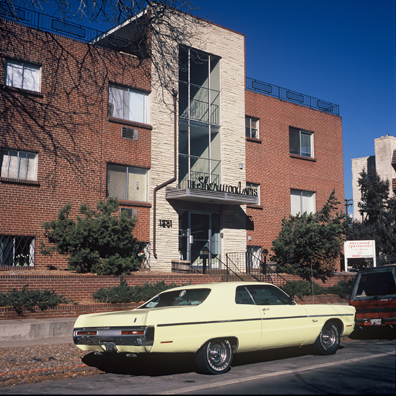 DISPLACED DENVER: THE SHERWOOD<br/>
2000 Ongoing <br/>
Cibachrome Print <br/>
Series of Denver Apartment Buildings Named After Famous Politicians, Artists, Landmarks, Neighborhoods, Beaches, Styles, Museums, Islands, Cocktails, Clothing, Pirates, Warriors, Automobiles, Restaurants, Race Tracks, Festivals, Writers, Cities, Explorers, Teams, Palaces, Stores, Poets, Song Writers, Hotels, Magazines, Fictional Places, Architectural Elements, Holidays, Etc <br/ >