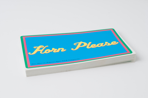 HORN PLEASE <br />
2009 Ongoing <br />
Custom Designed Bumper Stickers—Inspired by the Indian Phrase, “Horn Please,” Commonly Painted on the Back of Indian Automotive Vehicles—Left for Viewers to Take and Tag Vehicles<br />
3” x 5” <br />
Edition of 100 <br />