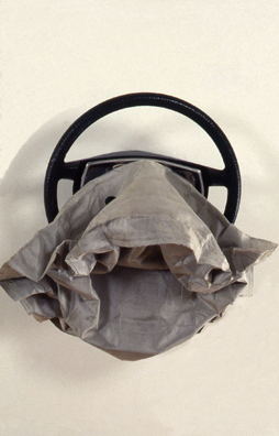 “LIFE IS SHORT, PLAY HARD”—'90s Reebok Ad Campaign Slogan <br/>
1992 Ongoing <br/>
Mercedes Steering Wheel with Exploded Air Bag<br/>
Variable Dimensions <br/>