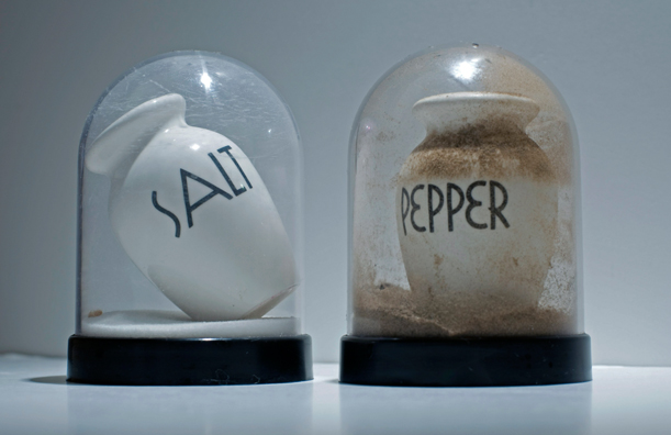 SHAKE: AN ACCUMULATED GIFT COLLECTION OF SALT AND PEPPER SHAKERS <br/>
1991 Ongoing <br/>
Detail: Gift of Virginie Tomassini & Emmanuelle Gaultier ('80s Vintage Ceramic Shakers)<br/>
Snow Globes Altered to Become Functioning Salt and Pepper Shakers, Each Filled with Salt and Pepper, and when Used, the Diminishing Salt and Pepper Reveals the Actual Accumulated Gift Collection of Shakers<br/>
3 1/2”H x 2 1/2” in Diameter<br/>