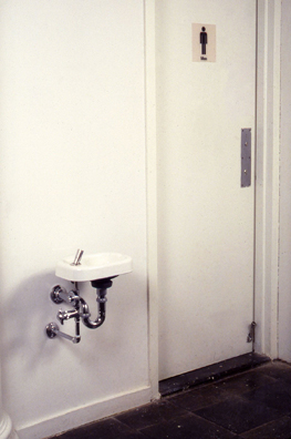 WELL <br/>
1992 Ongoing <br/>
Functioning Child's Height Drinking Fountain Installed in New Museum, Near Men's Bathroom, Available for Viewers to Drink Water Throughout the Duration of the Exhibition <br/>
30” x 11” x 8” <br/>