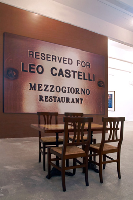 RESERVED FOR LEO CASTELLI: <i>SINCE CEZANNE</i> (After Clive Bell)<br />
2010 <br/>
Lateral View <br />
Wall: C-Print Wall Mural of Name Plate Reserving a Table in Perpetuity for the Preeminent Art Dealer Leo Castelli<br />
Floor: 2 Tables and 4 Chairs from the Restaurant Mezzogiorno<br />
Variable Dimensions<br />